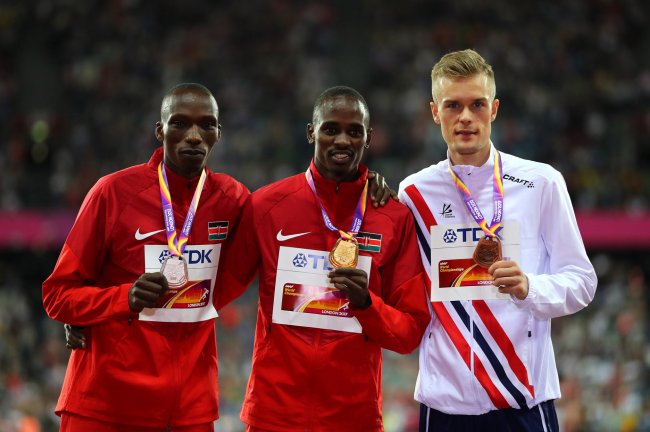 Gold medallist Elijah Manangoi  poses with silver medallist Timothy Cheruiyot and bronze medallist Filip Ingebrigtsen of Norway after the Men's 1500m Final. (Getty Images for IAAF)